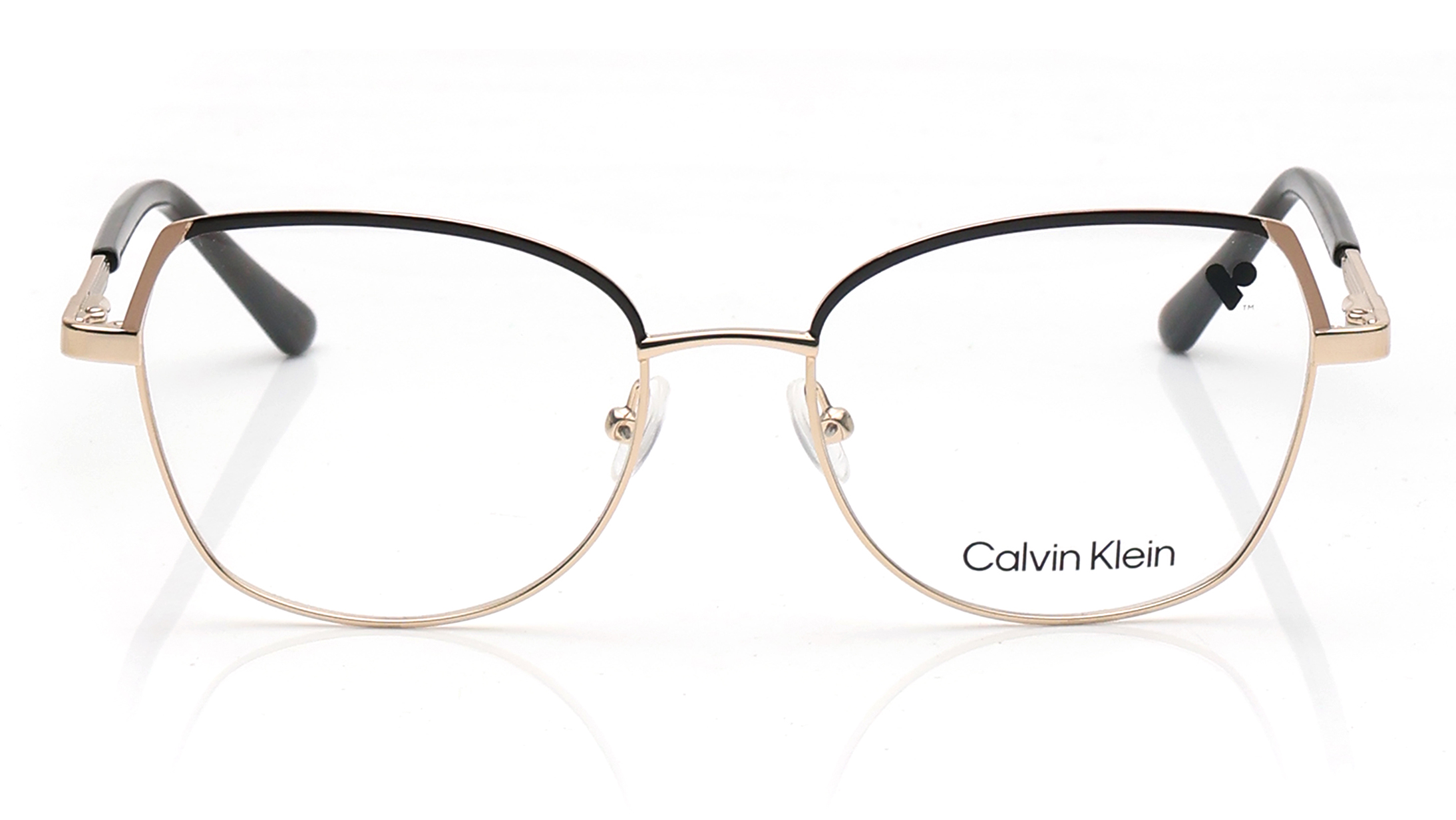 Image 1 of Gold Oval Eyeglasses for Women from Calvin Klein Available at Titan Eye+