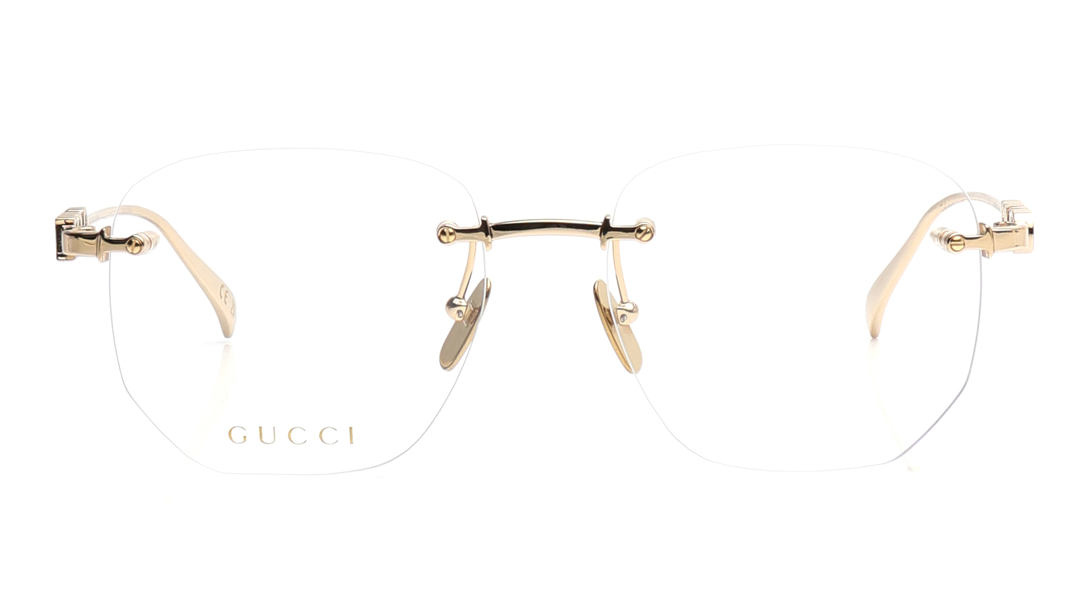 Image 1 of Gold Rectangle Eyeglasses for Women from Gucci Available at Titan Eye+