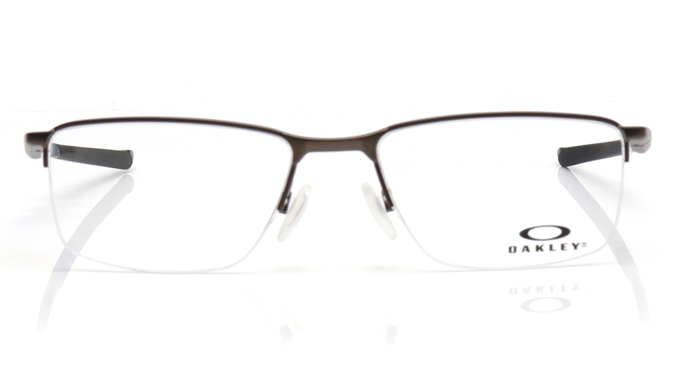 Image 1 of Blue Rectangle Rimless Eyeglasses for Men from Oakley Available at Titan Eye+