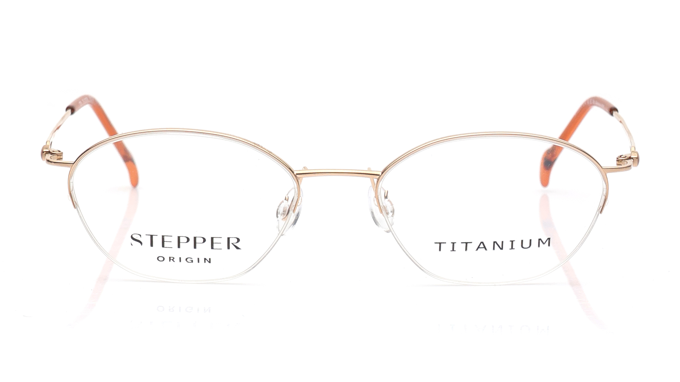 Image 1 of Gold Oval Eyeglasses for Women from Stepper Available at Titan Eye+