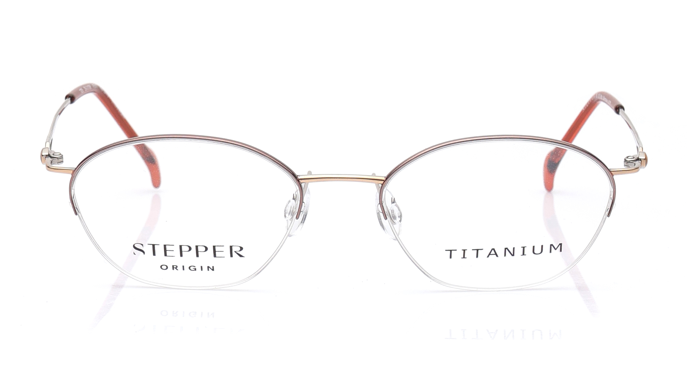Image 1 of Brown Oval Eyeglasses for Women from Stepper Available at Titan Eye+