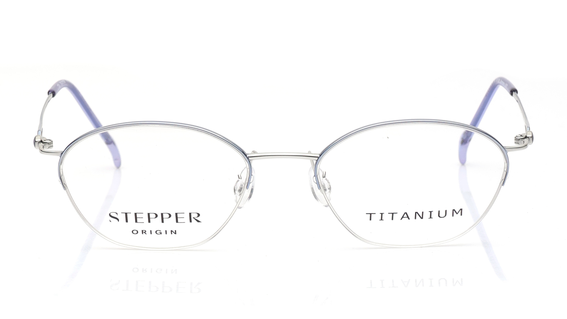 Image 1 of Blue Oval Eyeglasses for Women from Stepper Available at Titan Eye+