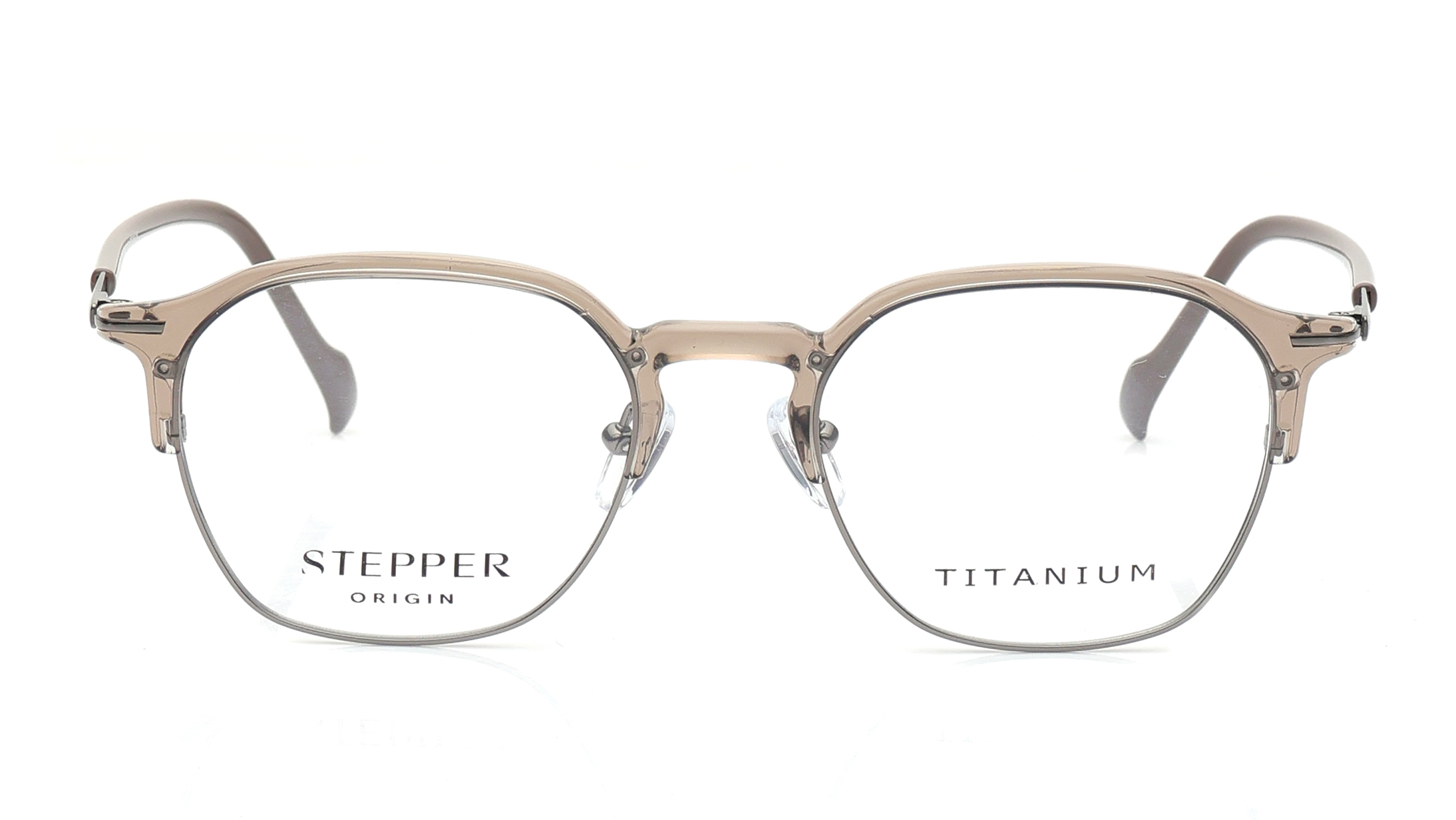 Image 1 of Brown Oval Eyeglasses for Women from Stepper Available at Titan Eye+