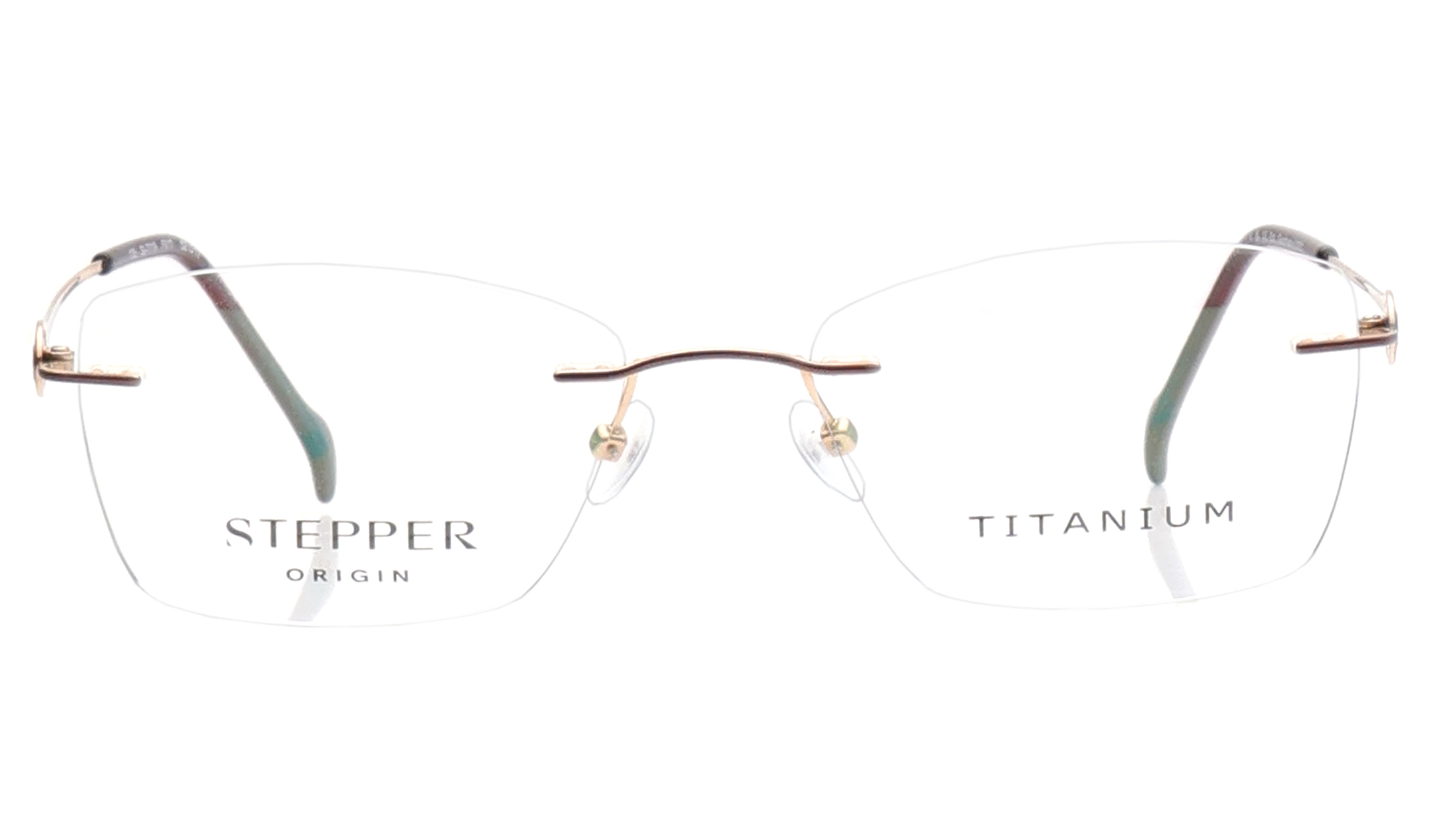 Image 1 of Brown Rectangle Eyeglasses for Women from Stepper Available at Titan Eye+