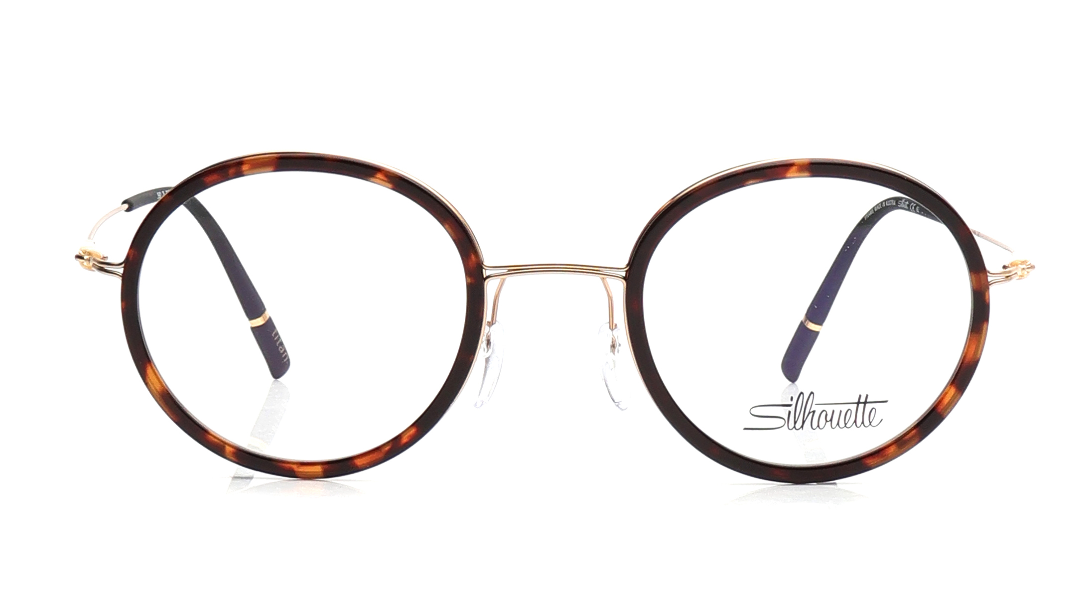 Image 1 of Brown Oval Eyeglasses for Men and Women from Silhouette Available at Titan Eye+