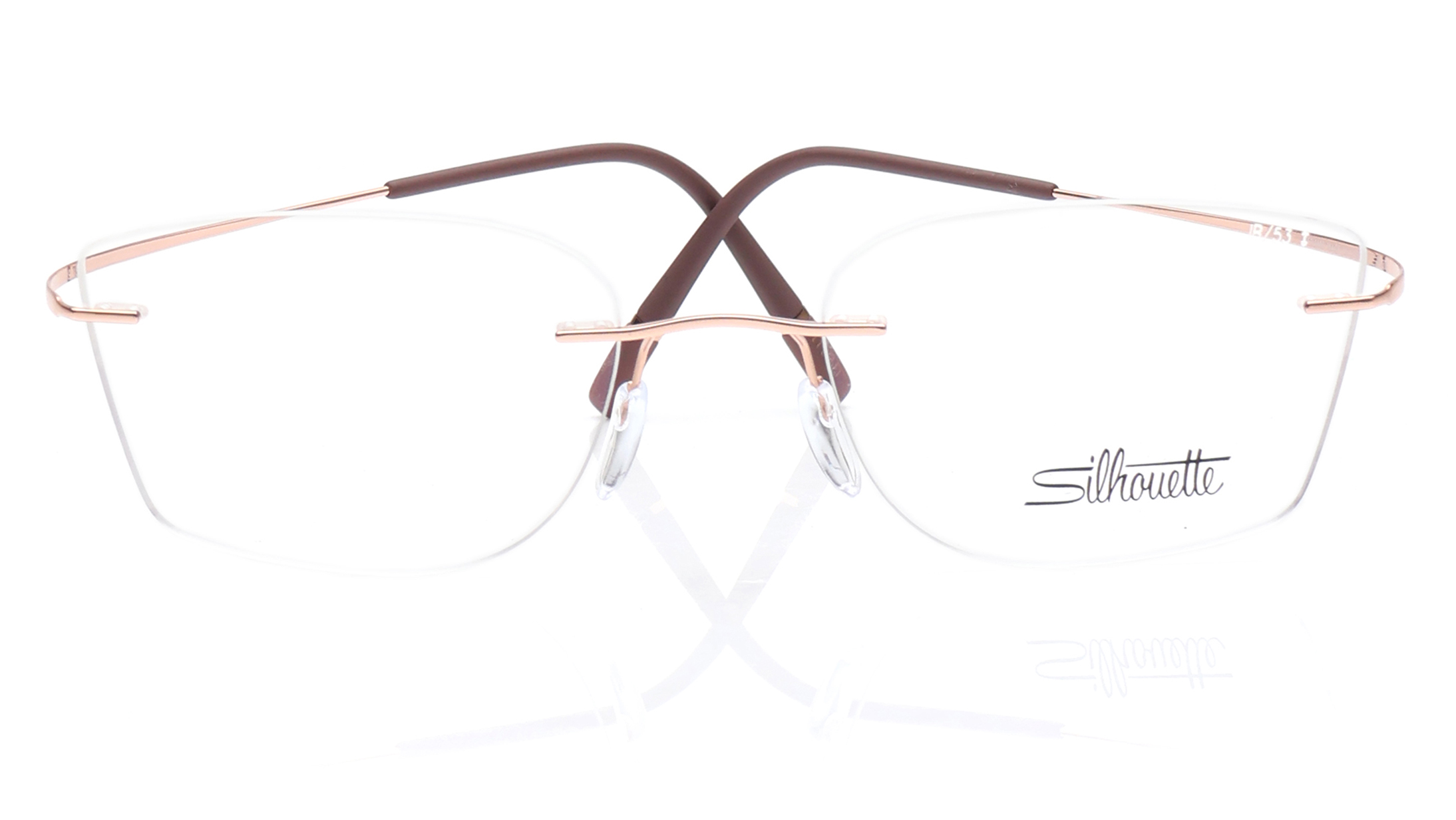 Image 1 of Butterfly Rose Gold Rim Less Eyeglasses for Women from Silhouette Available at Titan Eye+