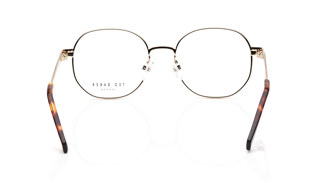 Image 4 of Gold Round Rimmed Eyeglasses for Women from Ted Baker Available at Titan Eye+