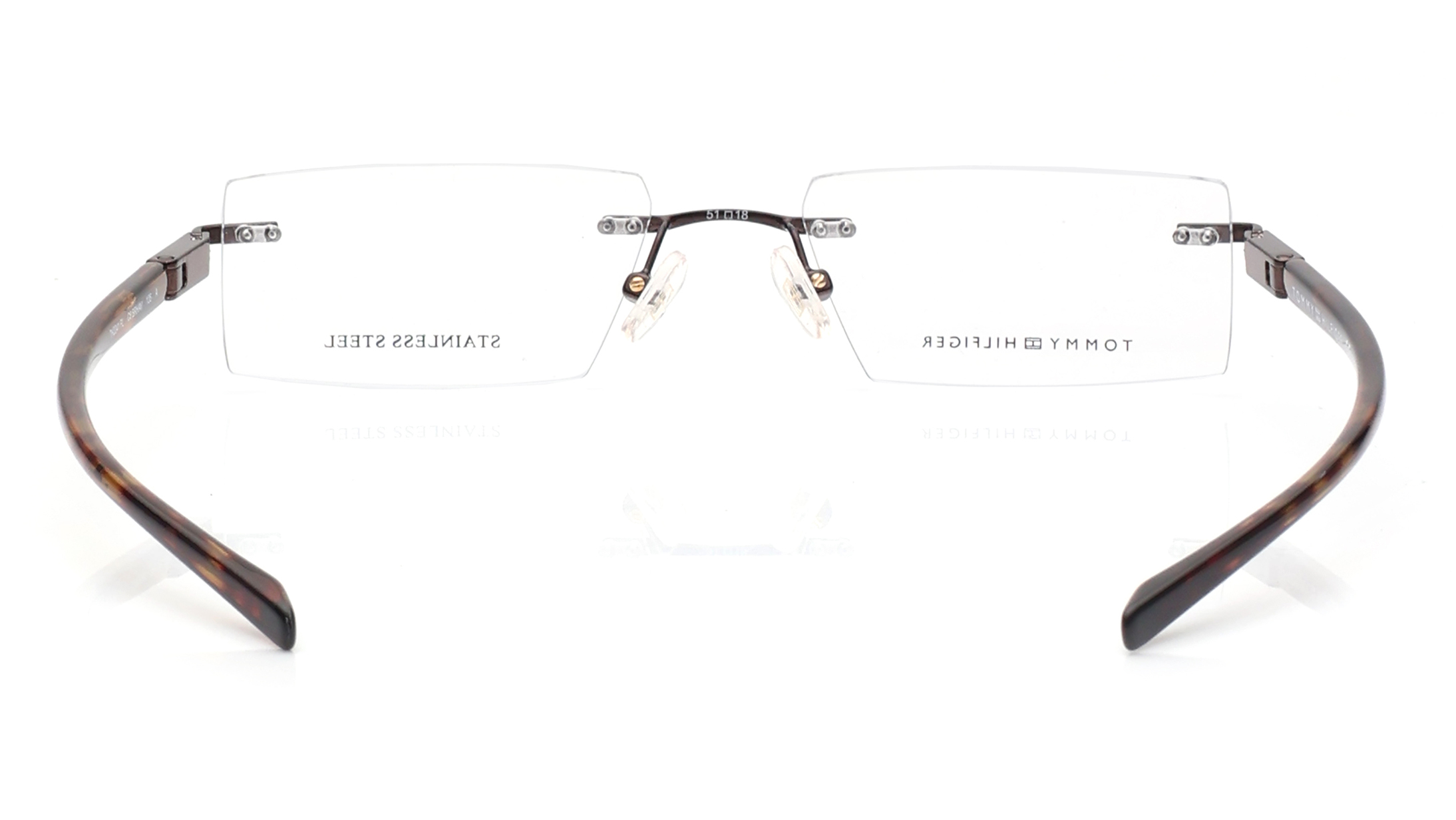 Image 4 of Brown Rectangle Rimless Eyeglasses for Men and Women from Tommy Hilfiger Available at Titan Eye+