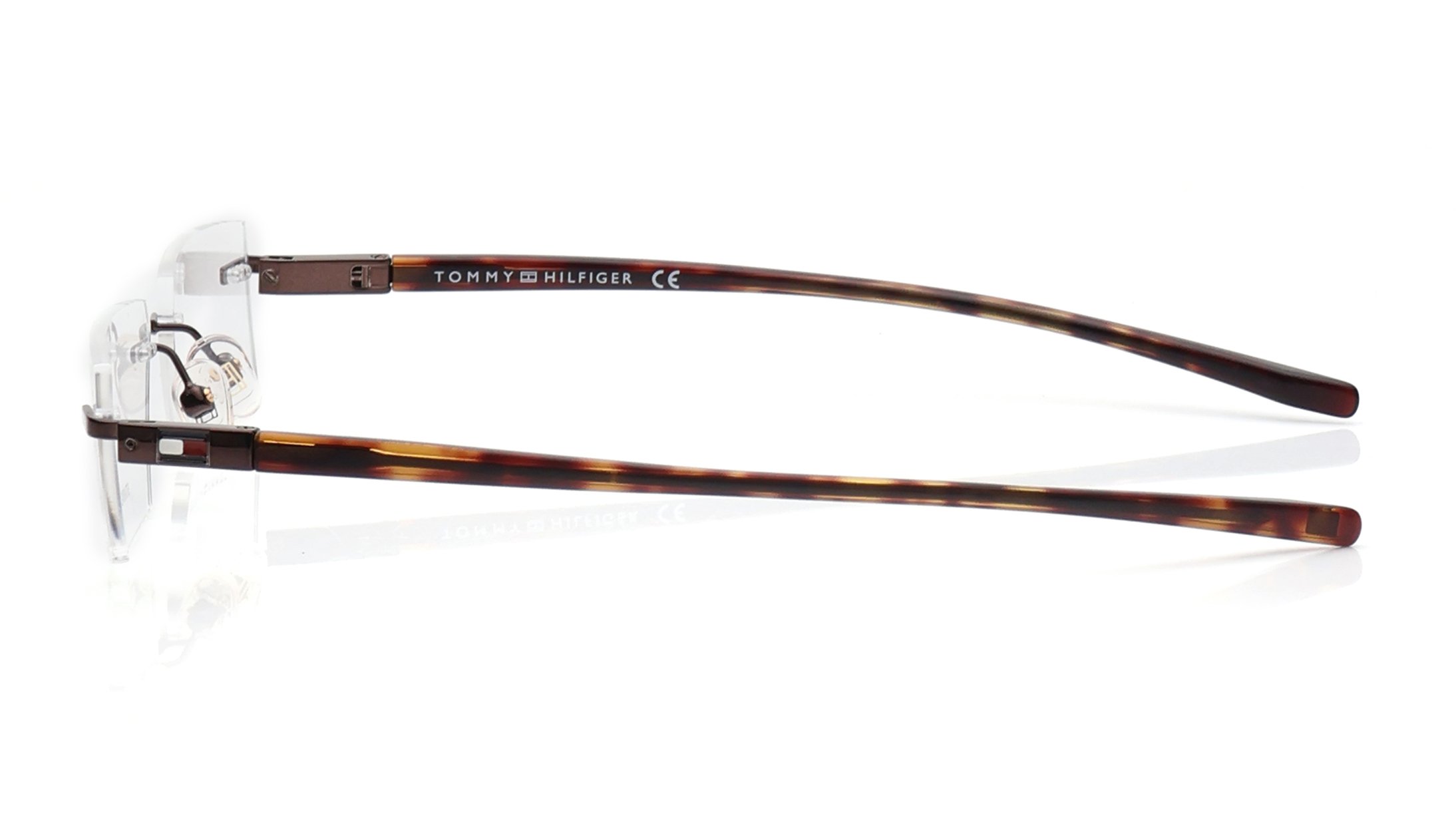 Image 7 of Brown Rectangle Rimless Eyeglasses for Men and Women from Tommy Hilfiger Available at Titan Eye+