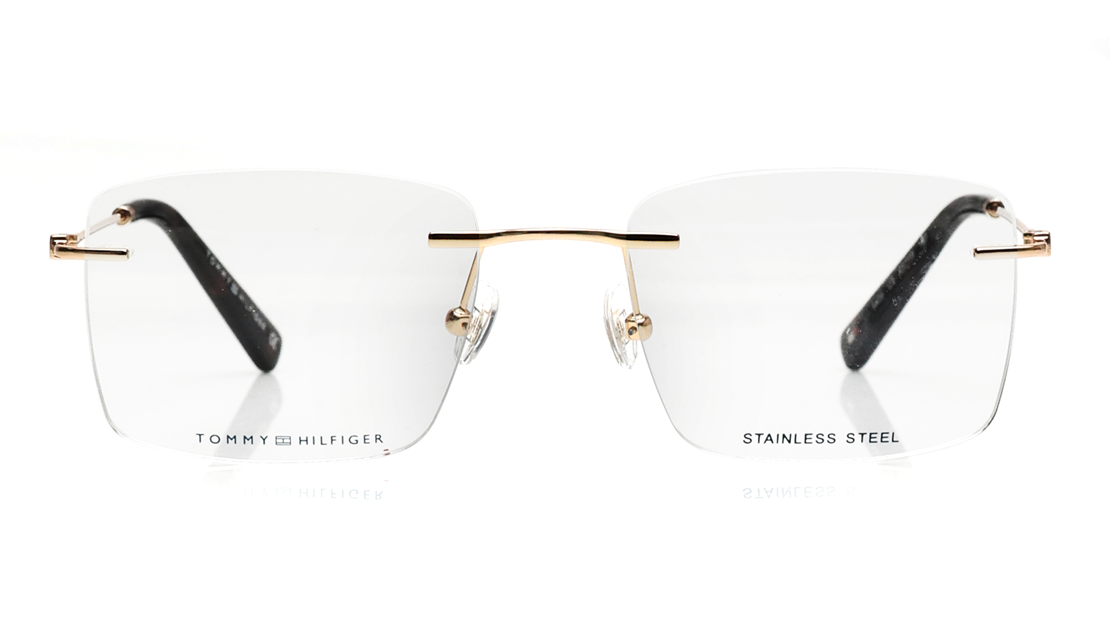 Image 1 of Gold Rectangle Eyeglasses for Men and Women from Tommy Hilfiger Available at Titan Eye+