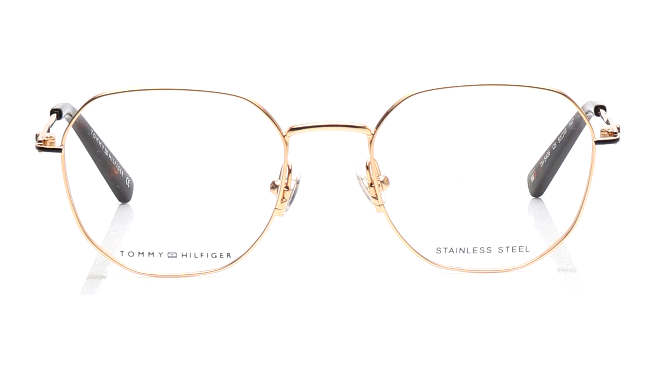 Image 1 of Gold Round Eyeglasses for Men and Women from Tommy Hilfiger Available at Titan Eye+