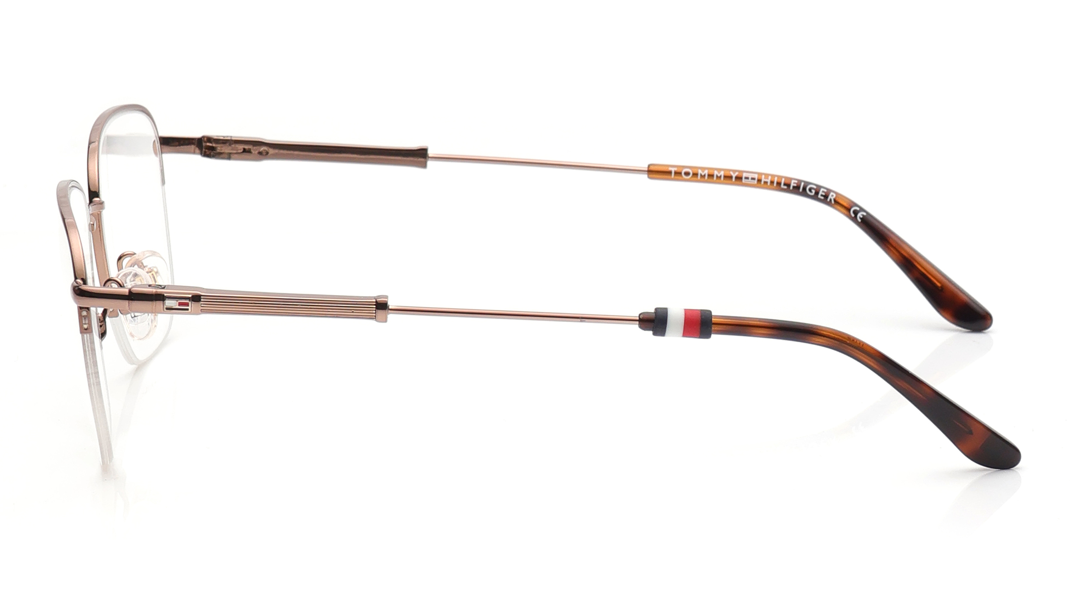 Image 7 of Brown Oval Eyeglasses for Men and Women from Tommy Hilfiger Available at Titan Eye+