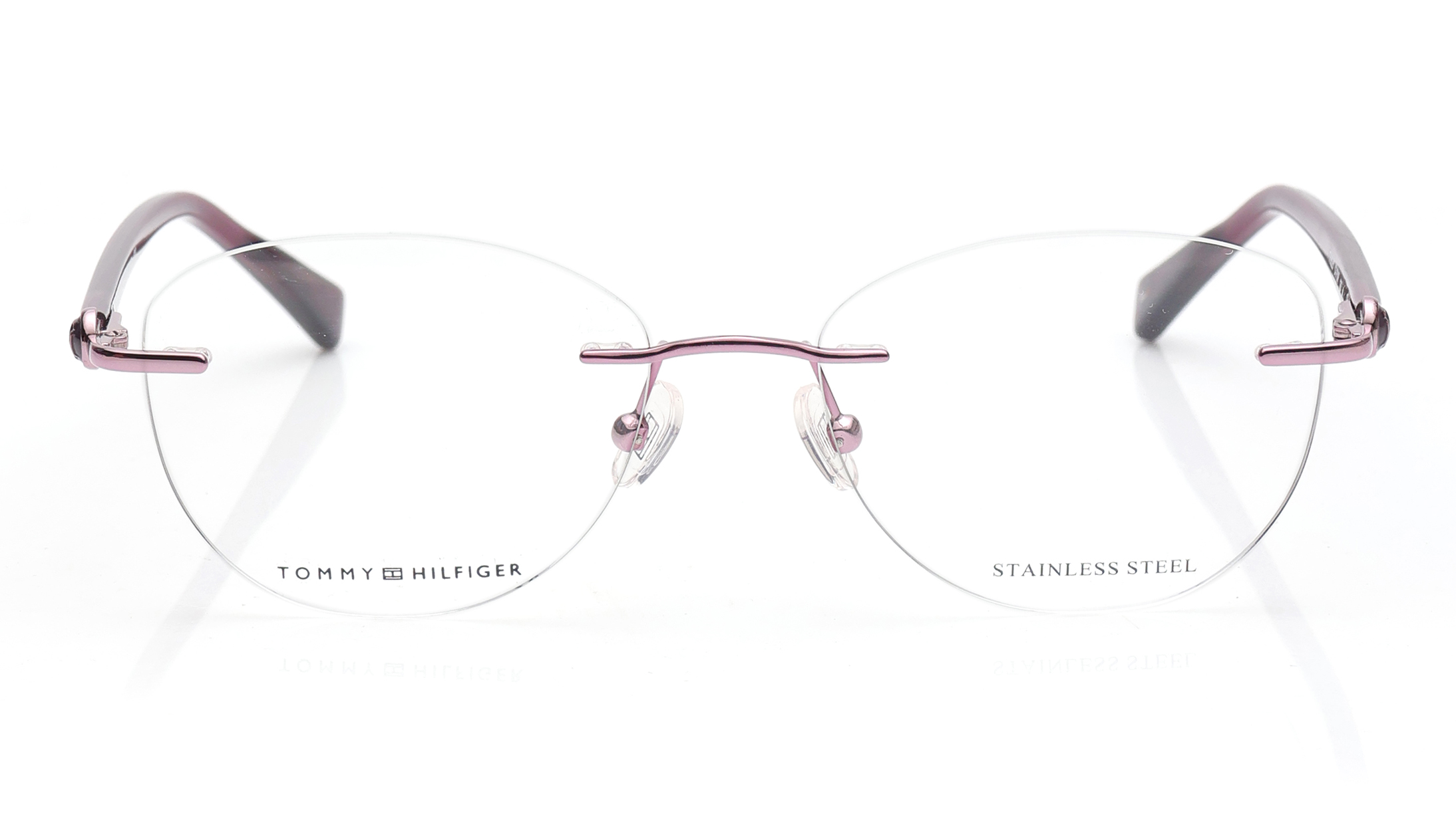 Image 1 of Purple Oval Eyeglasses for Women from Tommy Hilfiger Available at Titan Eye+