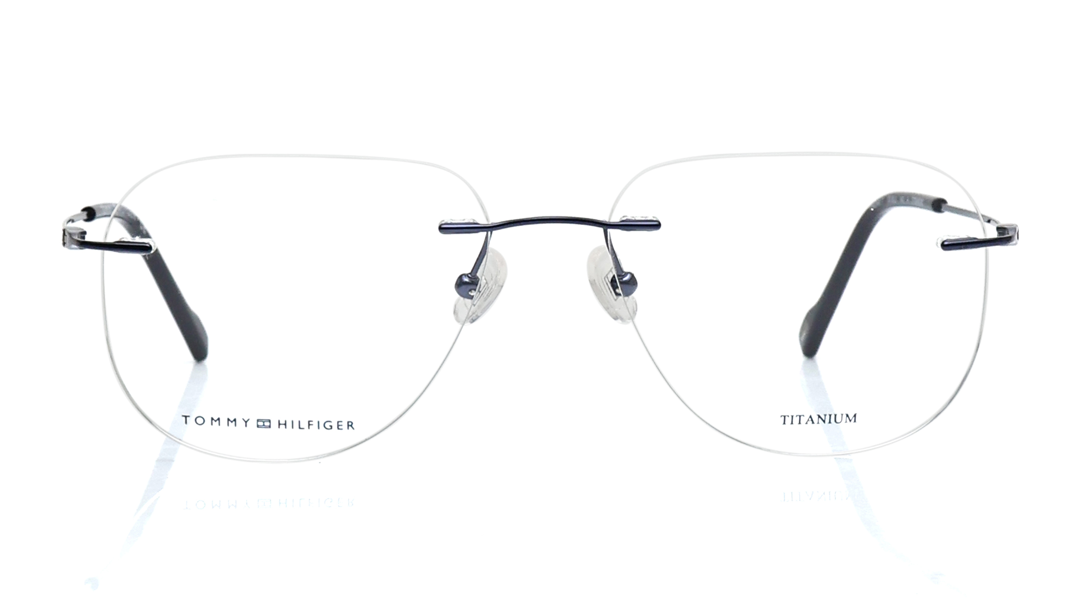Image 1 of Gunmetal Square Rimless Eyeglasses for Men from Tommy Hilfiger Available at Titan Eye+