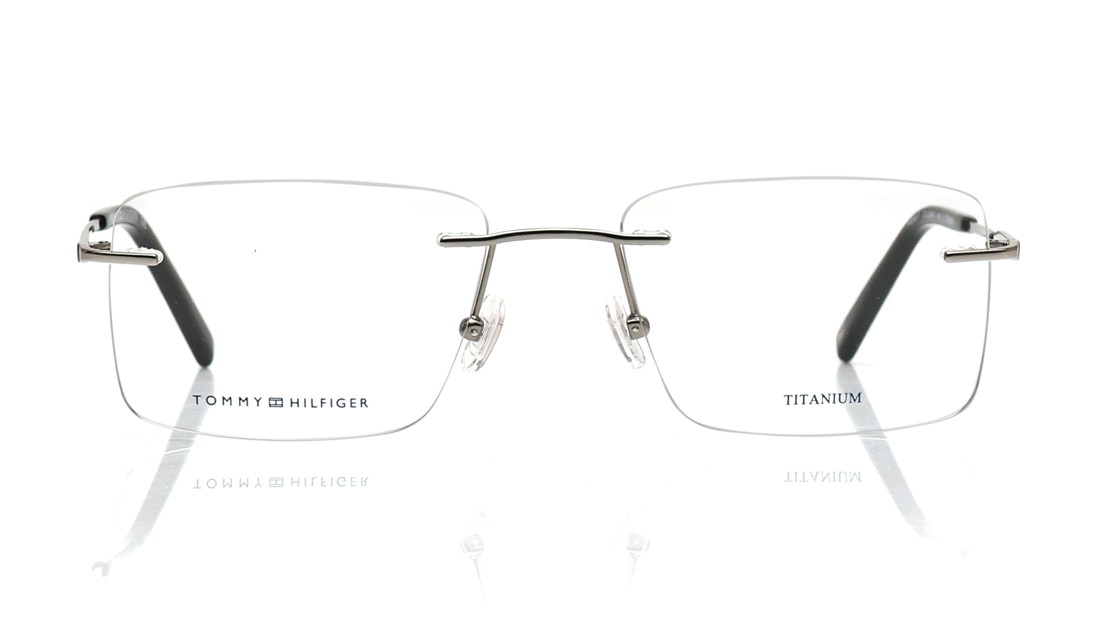 Image 1 of Blue Rectangle Rimless Eyeglasses for Men and Women from Tommy Hilfiger Available at Titan Eye+