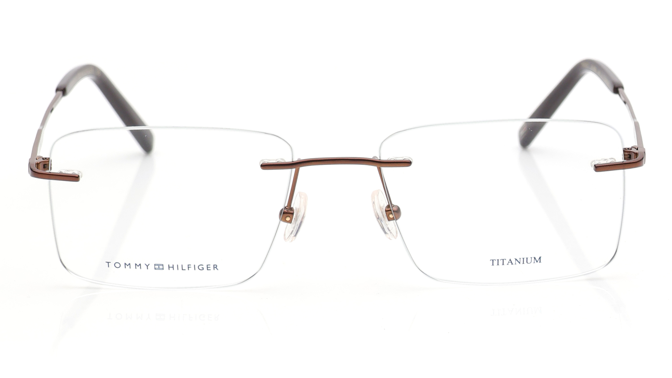 Image 1 of Brown Rectangle Eyeglasses for Men and Women from Tommy Hilfiger Available at Titan Eye+
