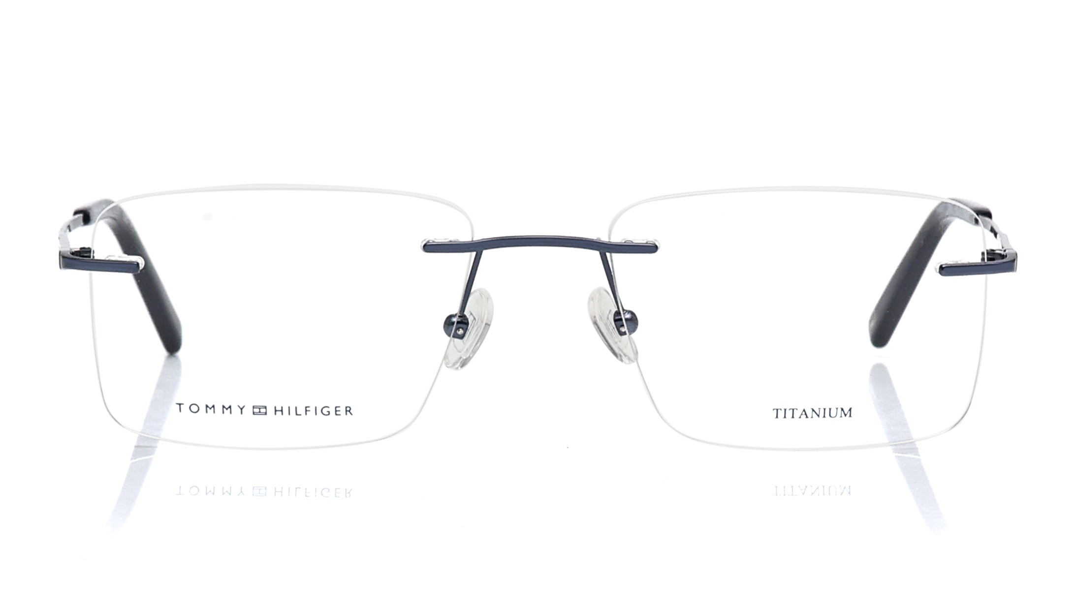 Image 1 of Brown Rectangle Rimless Eyeglasses for Men and Women from Tommy Hilfiger Available at Titan Eye+