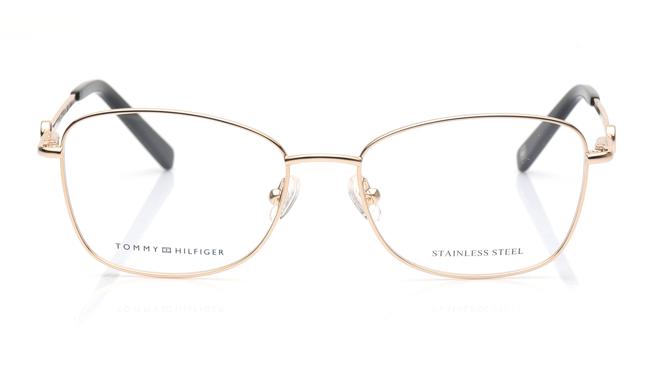 Image 1 of Gold Oval Eyeglasses for Women from Tommy Hilfiger Available at Titan Eye+