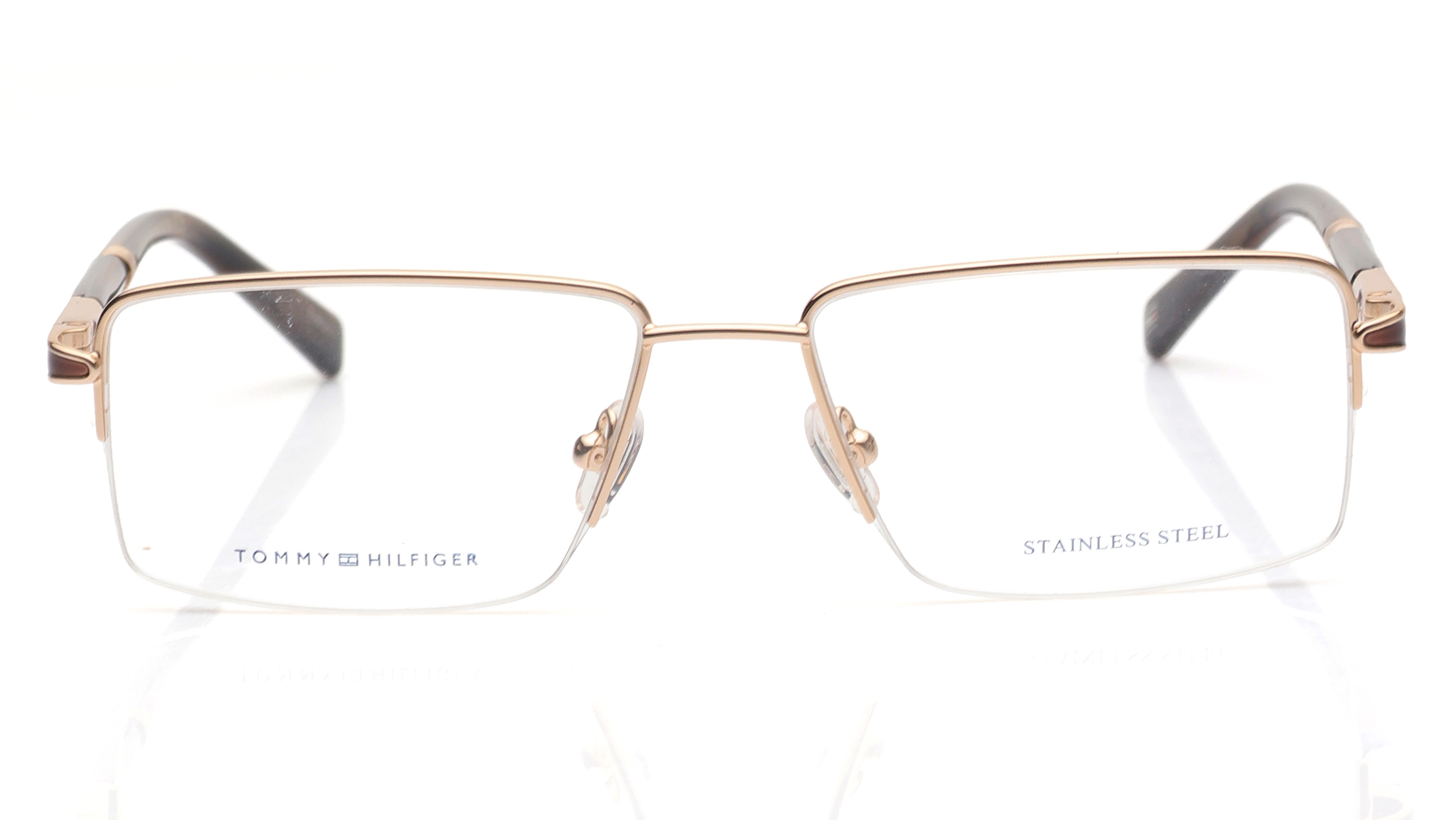 Image 1 of Gold Rectangle Eyeglasses for Men from Tommy Hilfiger Available at Titan Eye+