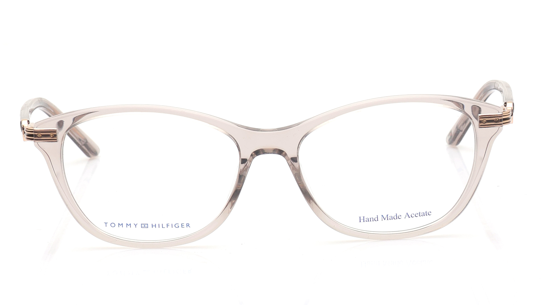 Image 1 of Brown Oval Eyeglasses for Women from Tommy Hilfiger Available at Titan Eye+