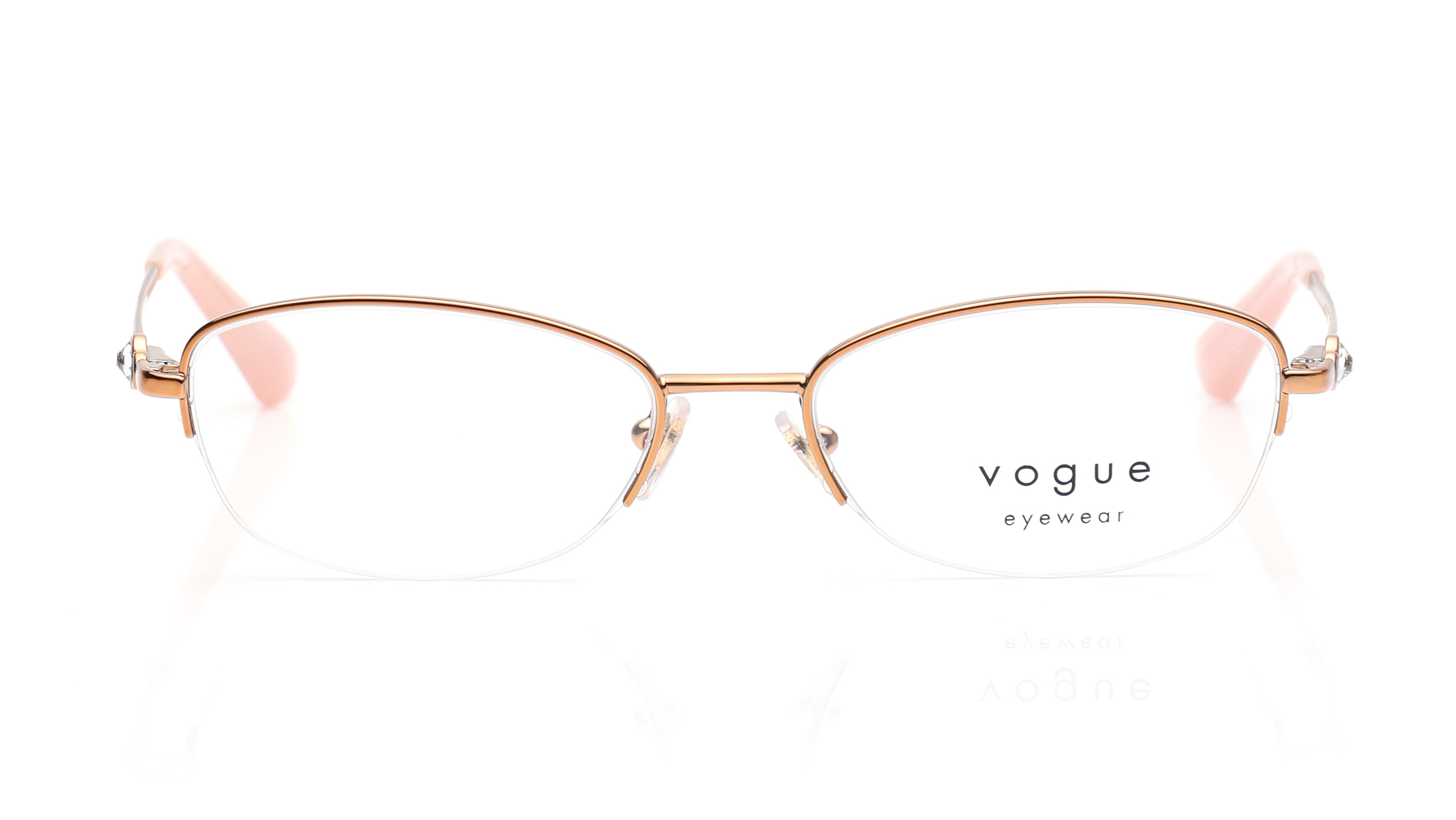 Image 1 of Gold Oval Eyeglasses for Women from Vogue Eyewear Available at Titan Eye+